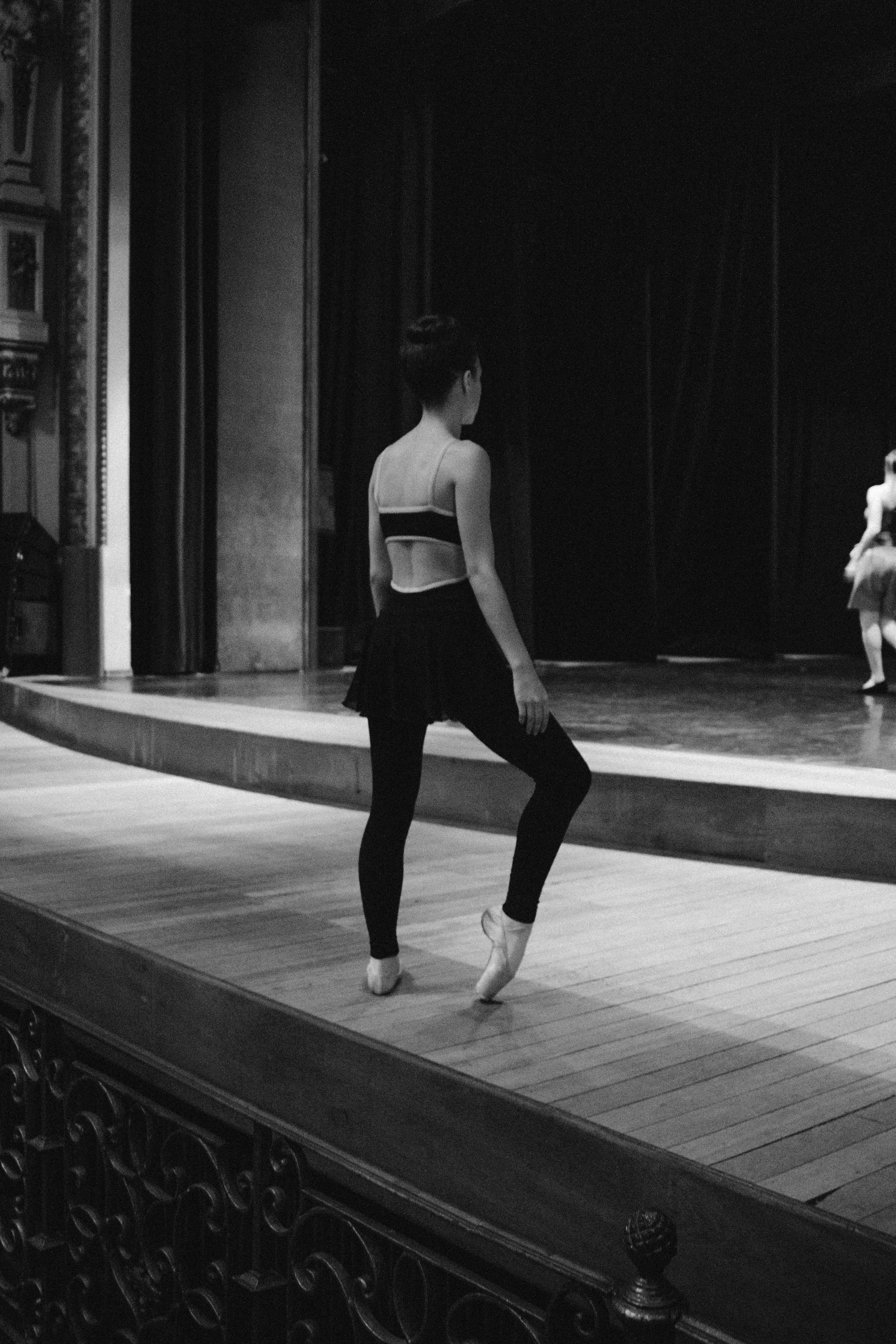 Dancer practicing on a theater stage