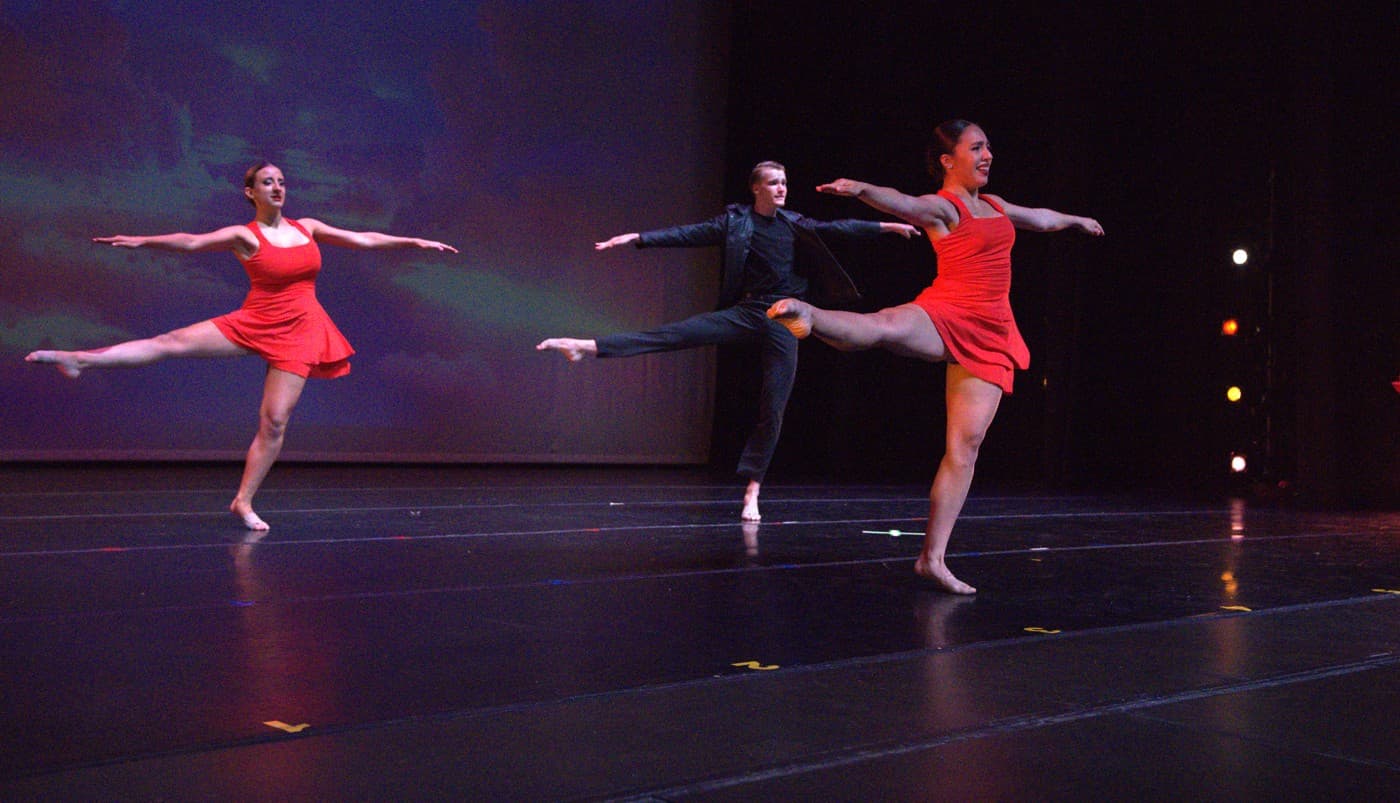Dancers practicing ballet technique